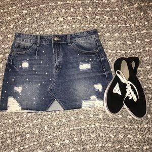 Edgy pearl ripped mini skirt
